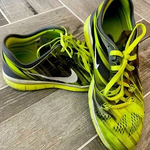 Neon yellow Nike runners